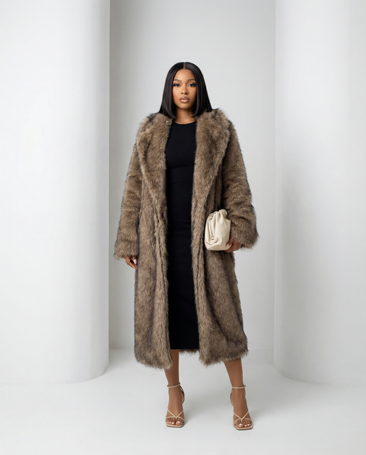 Beige Eden longline faux-fur coat with a wide shawl collar, straight-on front view, full length