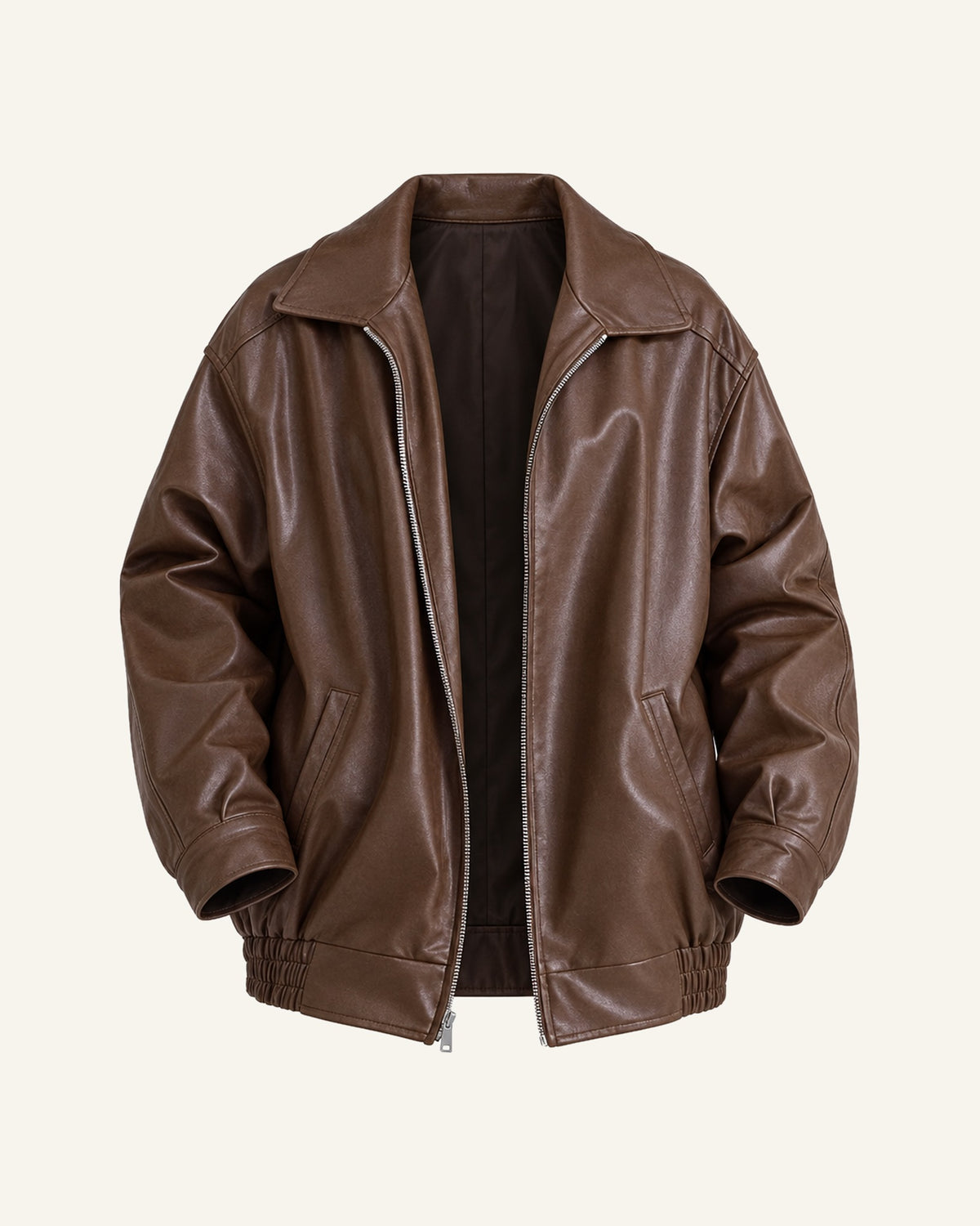Liv oversized faux leather jacket in brown shown alone, front zip and gathered hem