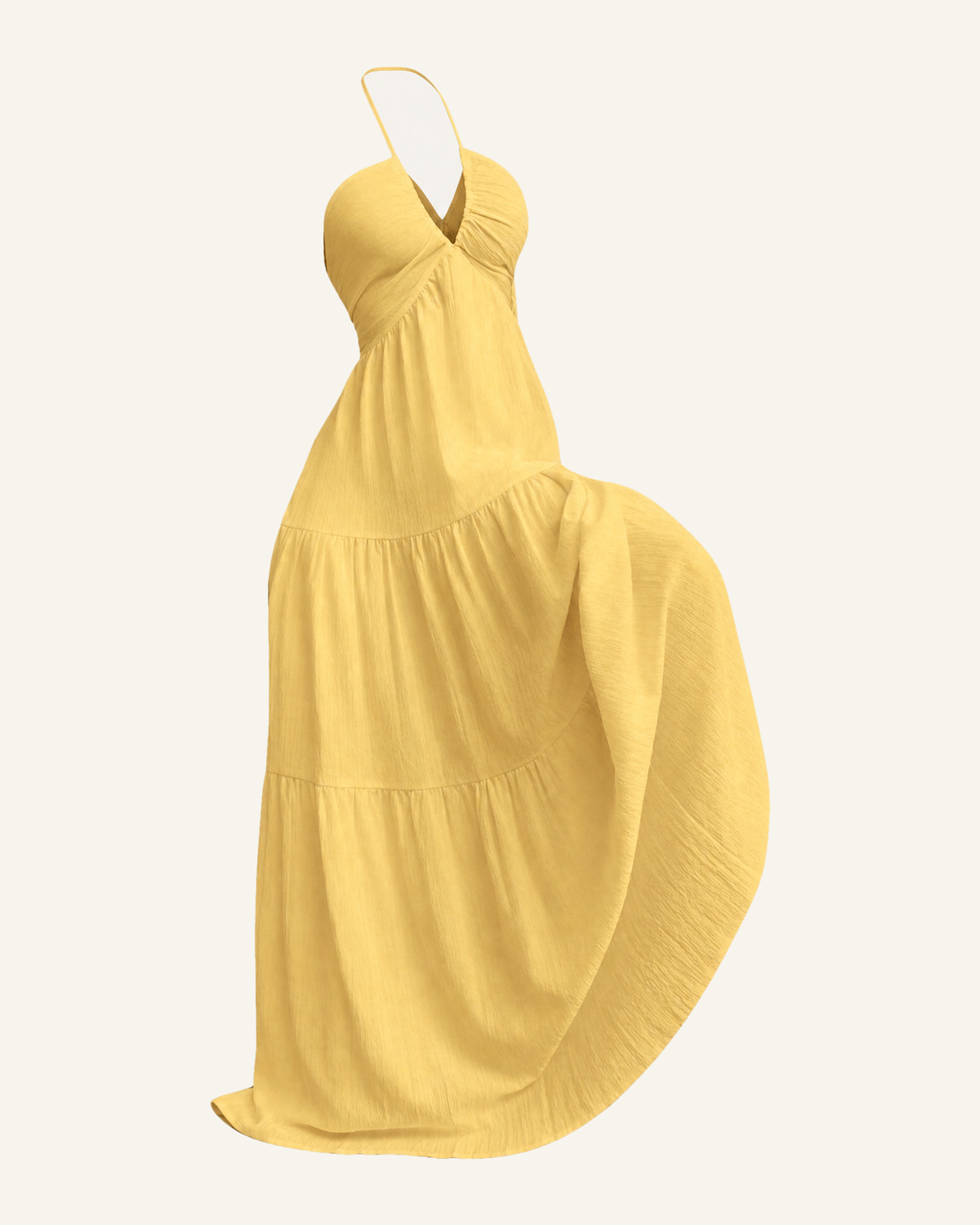 The Alva halter tiered maxi dress in soft butter yellow, shown alone against a bone background, full length
