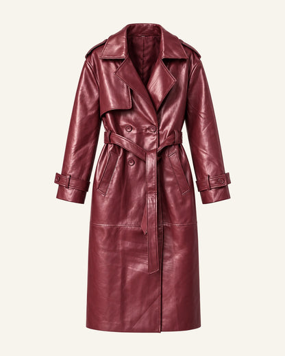 The Alya vegan leather trench in burgundy shown alone on a bone background, belted, front view