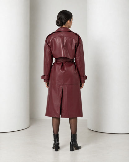 Back of the Alya burgundy trench, the cape yoke across the shoulders and the vent at the centre back