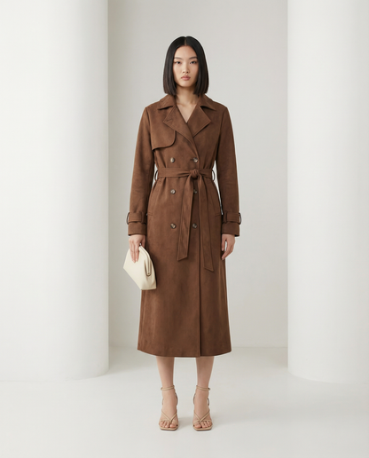 Chestnut brown Alya trench in suede, double-breasted with the belt tied at the waist, full length