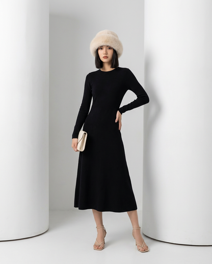 Ivory Aria fuzzy hat styled with a long-sleeve black midi dress, full-length front view