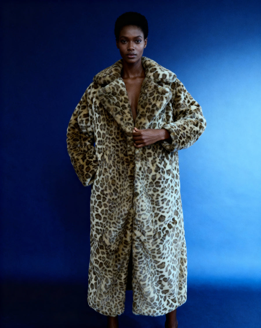 Aurelia Leopard Faux-Fur Coat in cocoa worn open over a black midi dress, front view