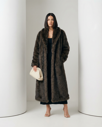 Brown longline faux-fur coat with wide notch lapels, seen three-quarter on, full length