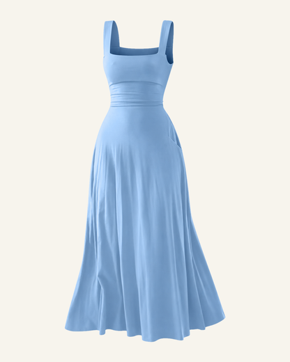 The Elin corset back midi dress in sky blue, shown alone against a bone background, full length