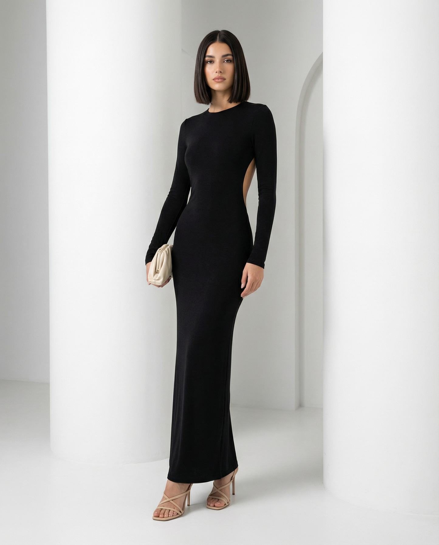 Black Elira open back dress, a long-sleeve maxi with slim column skirt, shown full length