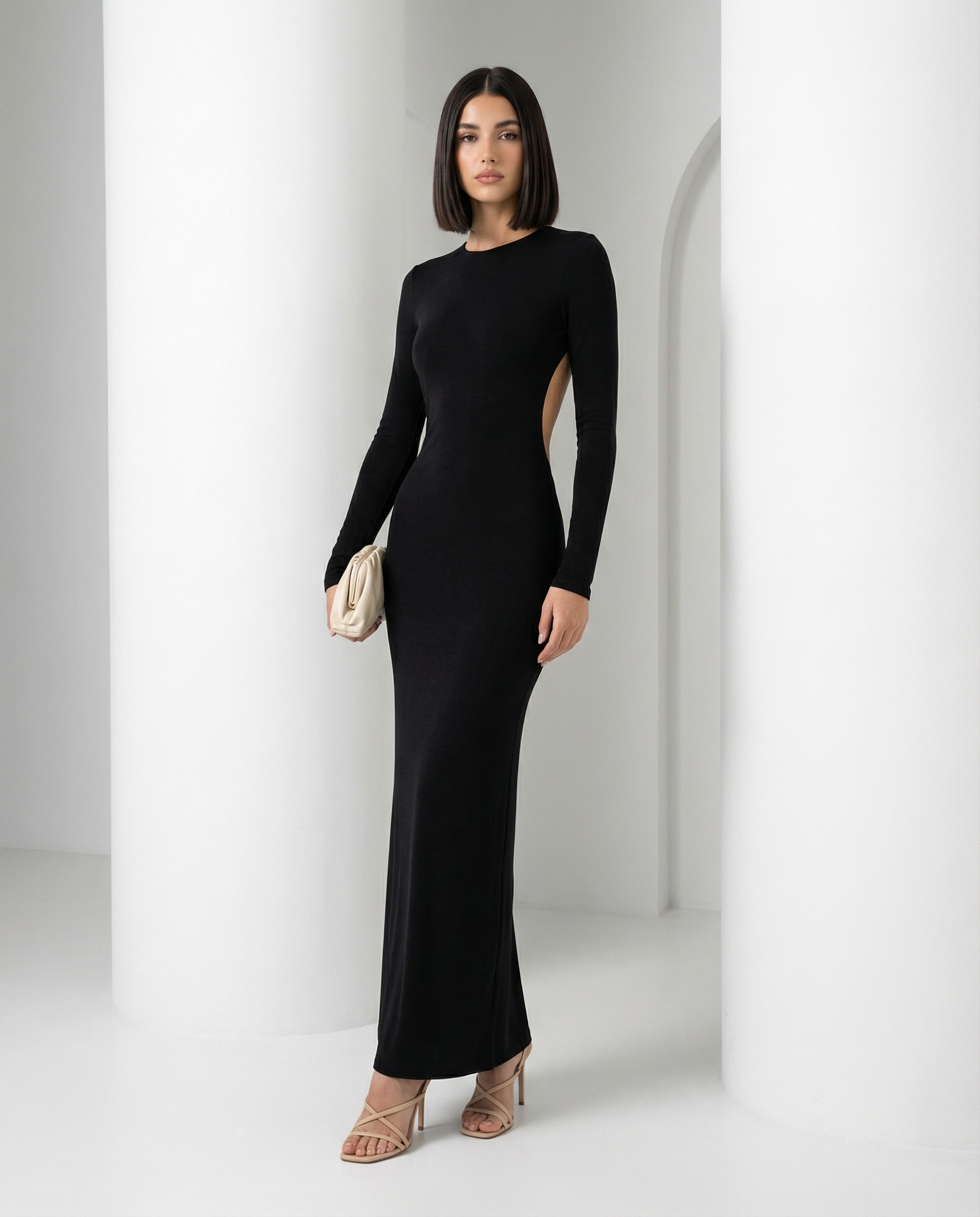 Black Elira open back dress, a long-sleeve maxi with slim column skirt, shown full length