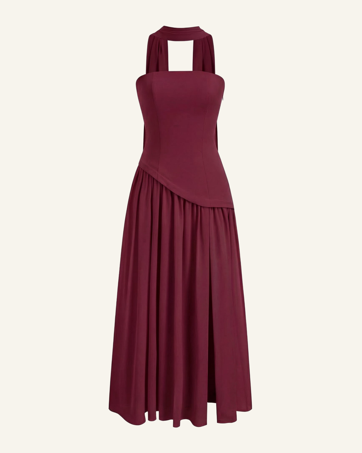The Embla lace-back maxi in burgundy, strapless bodice and full chiffon skirt, alone on a bone background