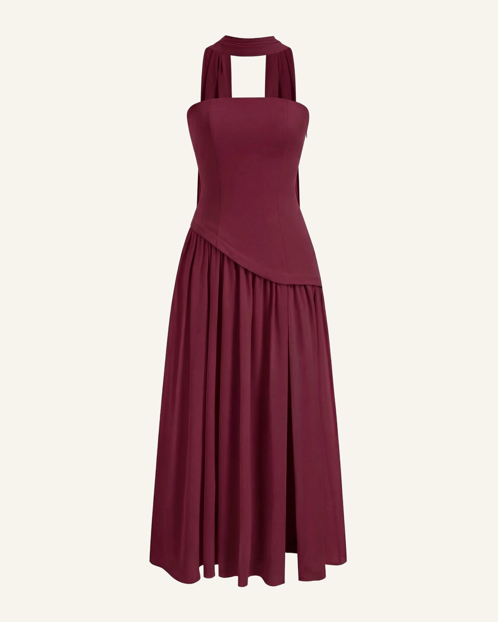 The Embla lace-back maxi in burgundy, strapless bodice and full chiffon skirt, alone on a bone background