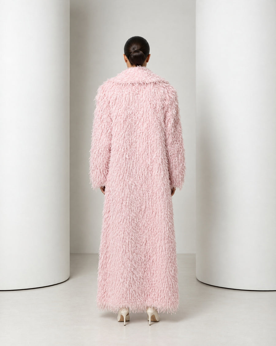 Freja faux feather long coat in blush, full-length front view worn closed over ivory