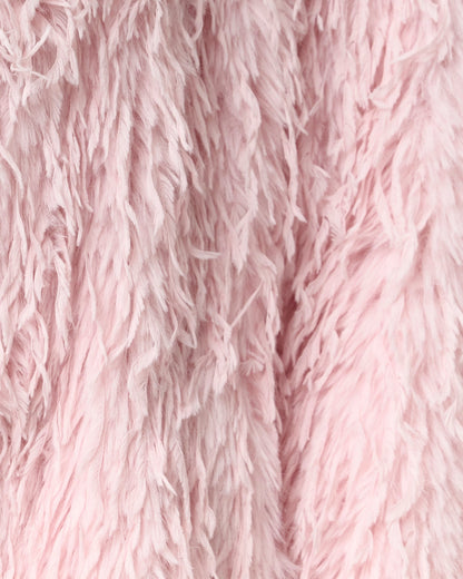 Detail of the long feathered faux fur pile on the Freja coat in blush