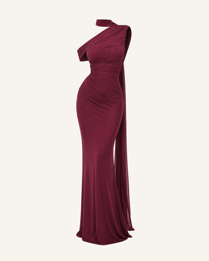 The Freya sash mermaid gown in wine shown alone against a bone background, full length