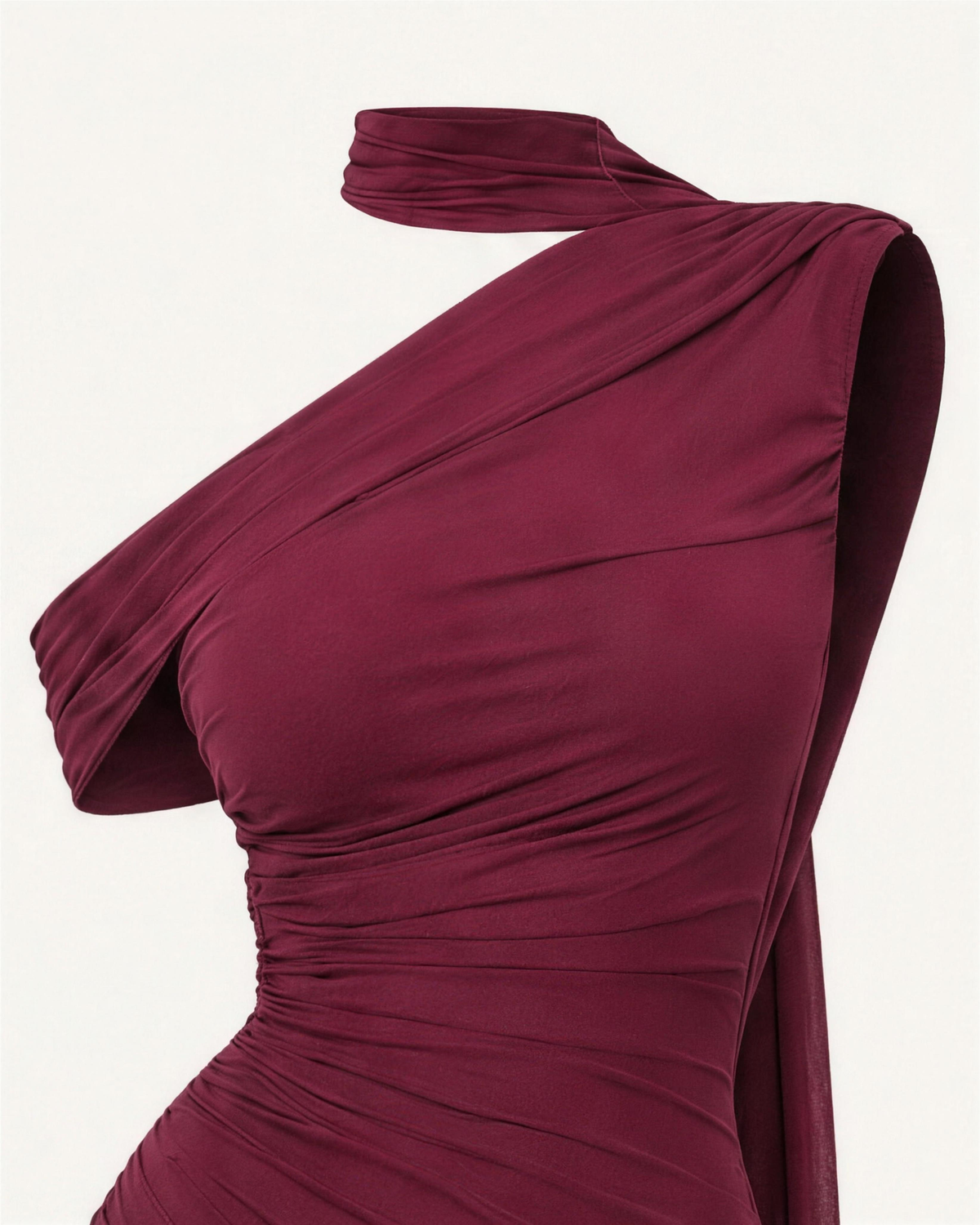 Detail of the Freya neck band and the sash crossing the shoulder in wine jersey