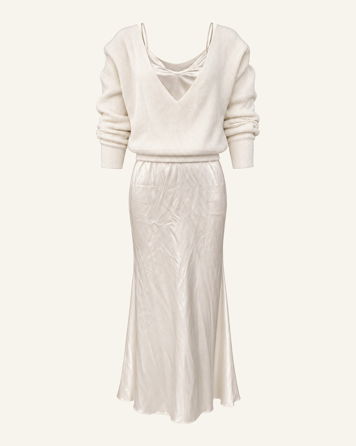 Ingrid cream rib-knit sweater over an ivory satin slip dress, shown on its own