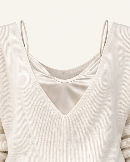Detail of the Ingrid V neckline framing the satin camisole and its thin straps