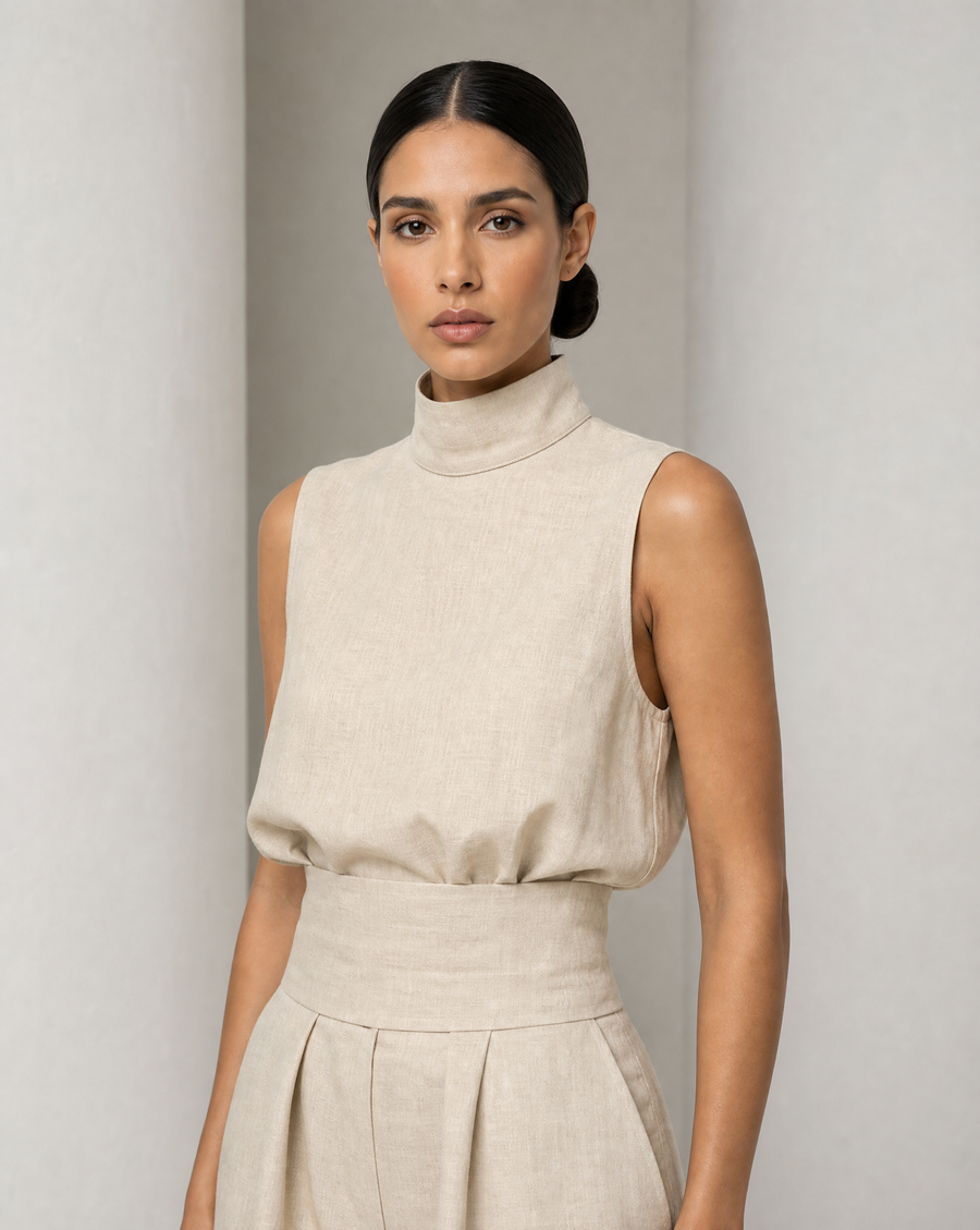 The Linnea pleated wide-leg set in oatmeal, sleeveless mock-neck top and full wide-leg trousers