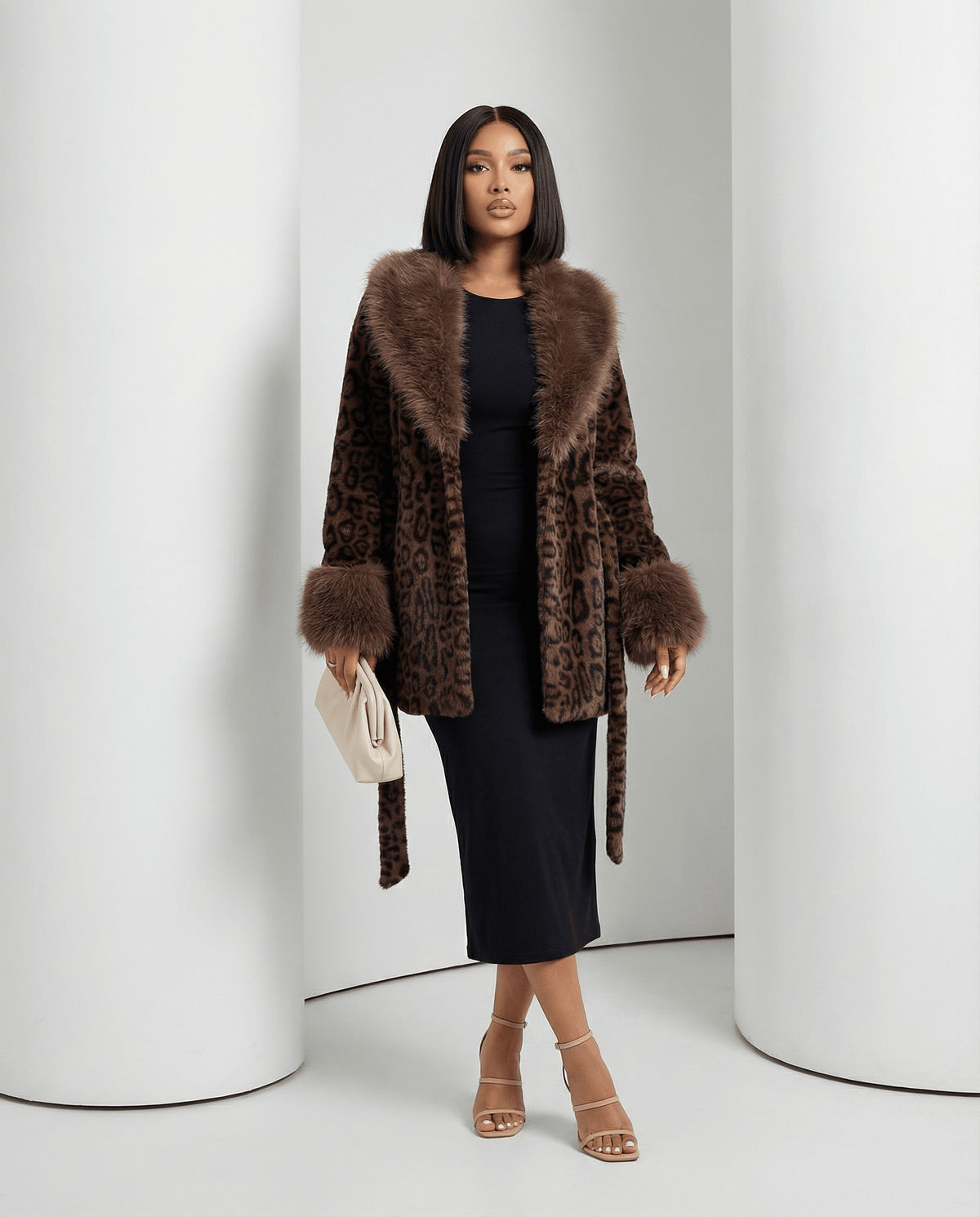 Marbella belted faux-fur coat in cocoa leopard worn open with the belt hanging loose, full length
