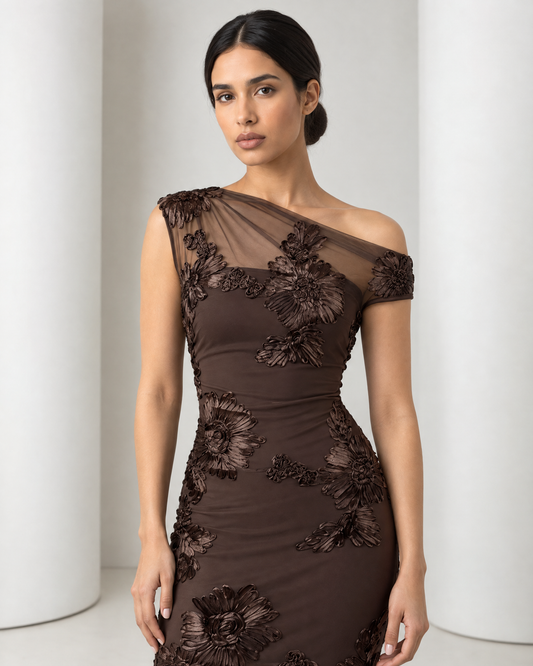 Close view of the Maren bodice showing the sheer illusion mesh, the seam where the lining begins, and the raised ribbon flowers