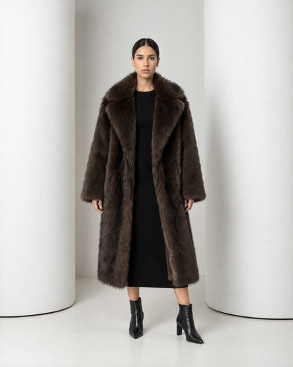 Mirella longline faux-fur coat in bitter chocolate worn open over a black knit midi dress, full length