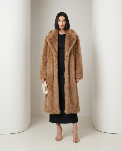 Amber fox Mirella longline faux-fur coat worn open over a black dress, full length front view