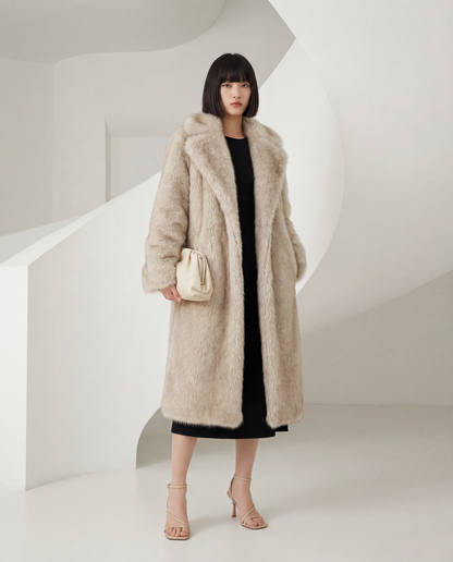 Beige Mirella longline faux-fur coat worn open over a black midi dress, full length front view