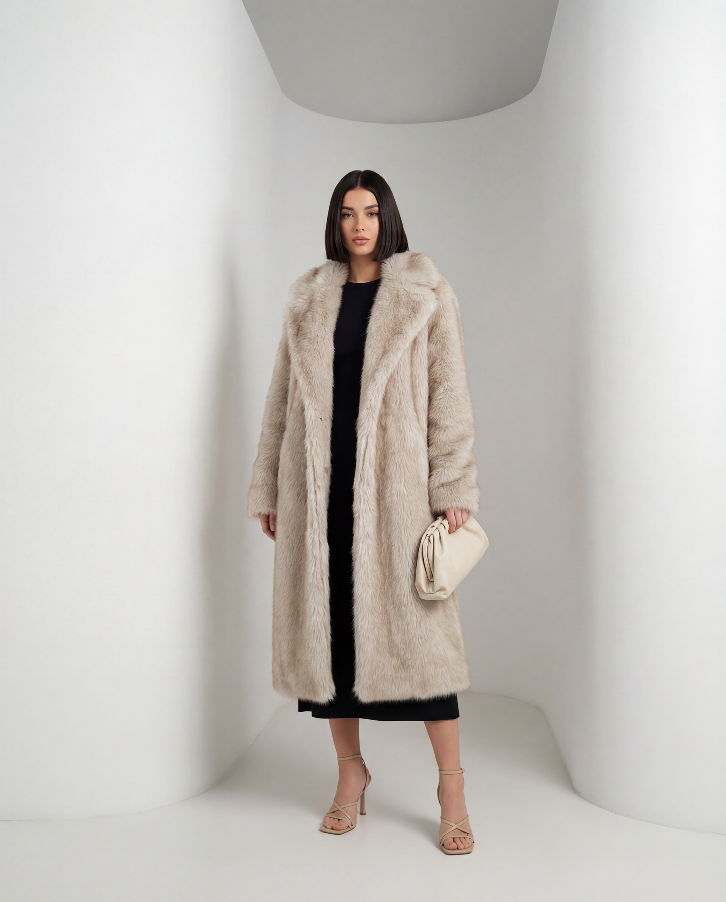 Beige faux-fur coat worn open with a cream pouch clutch, straight-on front view in a white studio