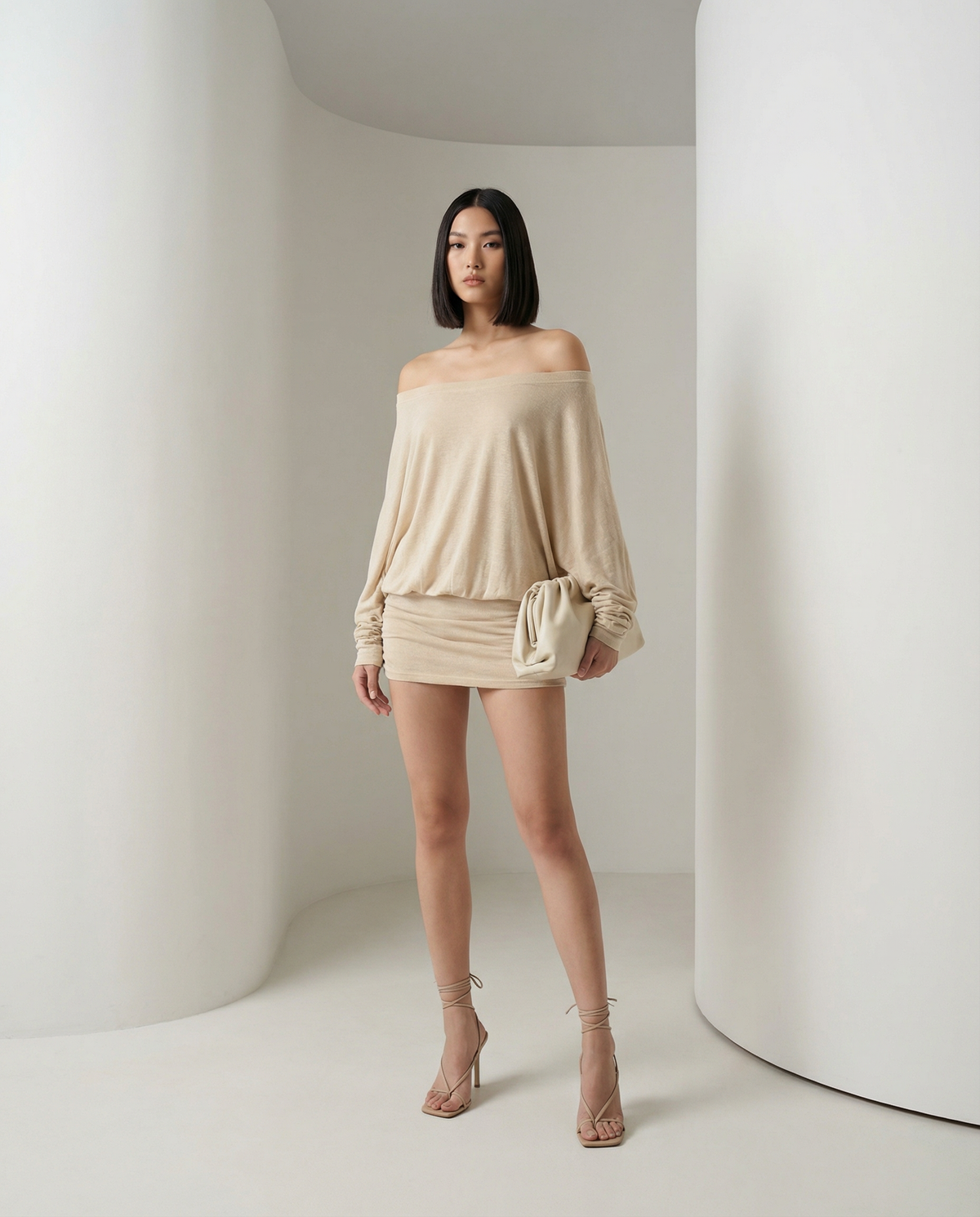 Beige Obsidian dress with off-shoulder neckline and blouson sleeves, full-length front view