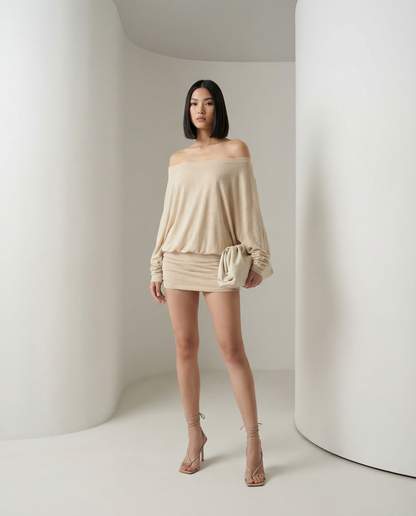 Beige Obsidian dress with off-shoulder neckline and blouson sleeves, full-length front view