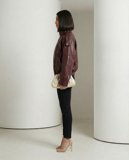 Burgundy Onyx Jacket side profile showing the chest flap pocket and ribbed cuff, full length