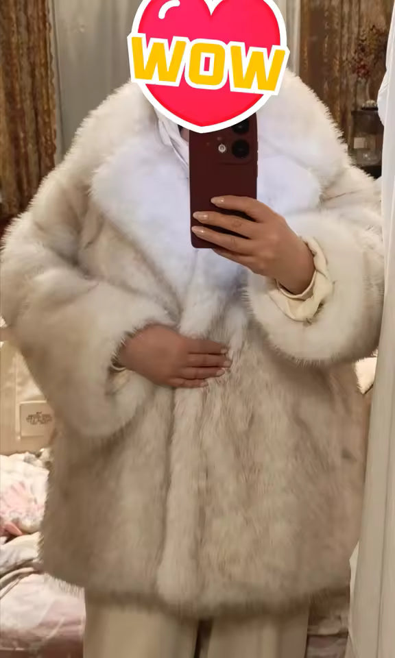 Cream faux-fur coat with a wide shawl collar in a bedroom mirror shot, a sticker over the face