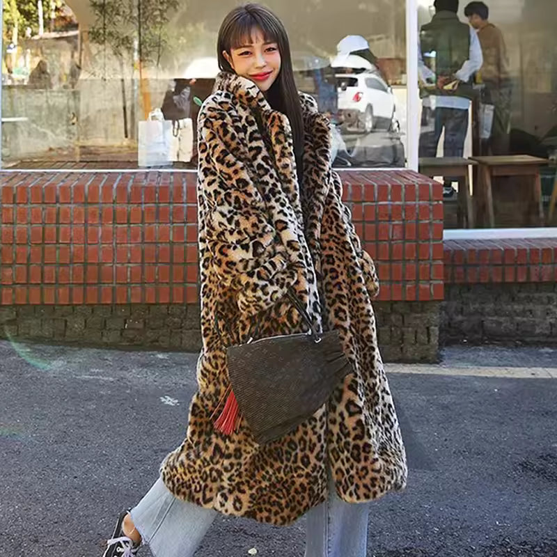 Customer wearing a long leopard-print faux fur coat with jeans and trainers on a street