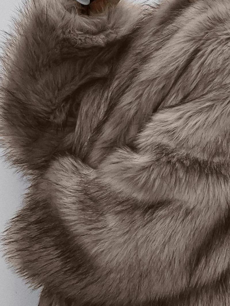 Close crop of a taupe faux fur coat, showing the stand collar and dense brushed pile