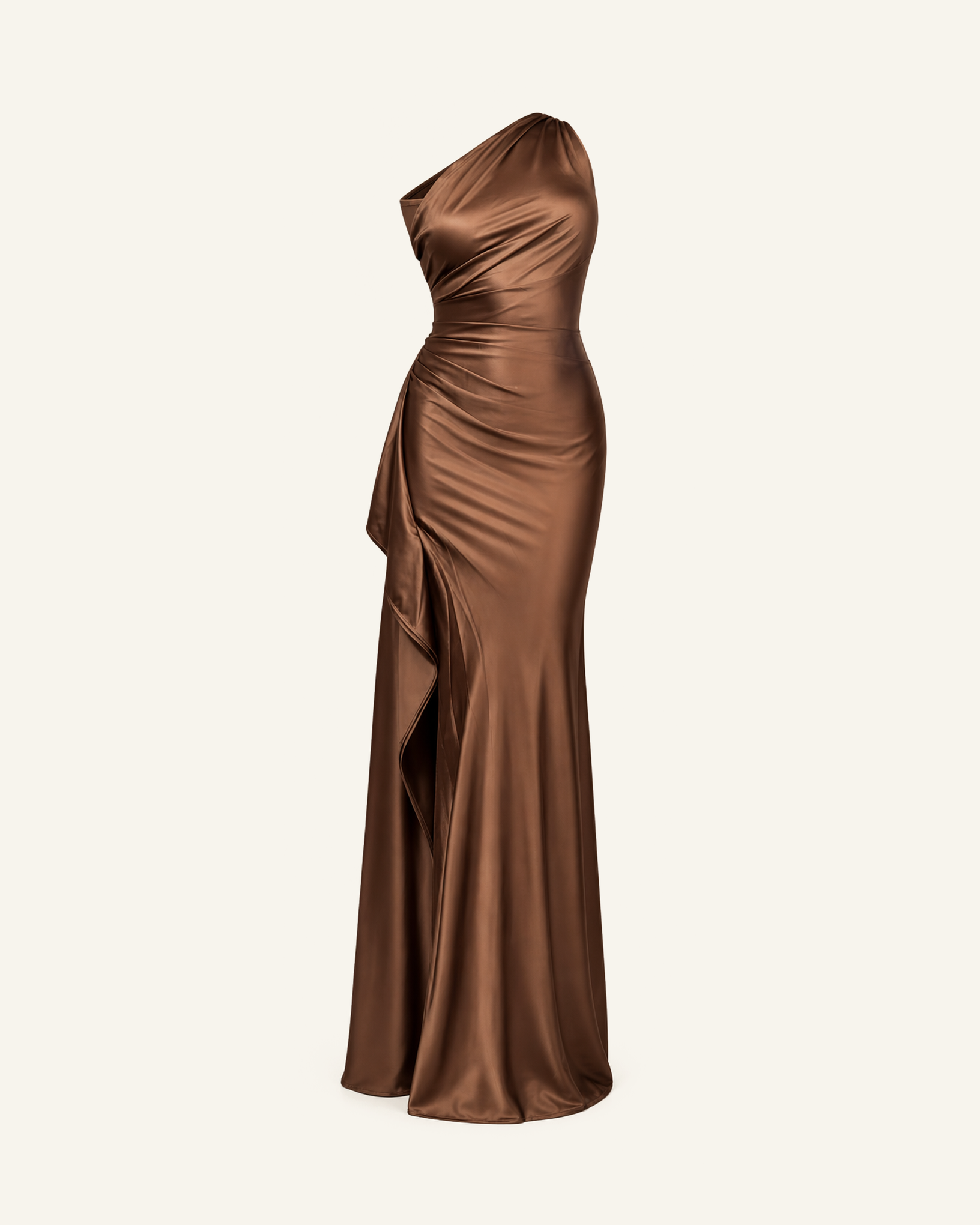 The Runa one-shoulder satin gown in mocha brown shown alone against a bone background