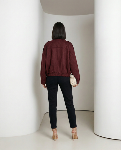 Burgundy suede cropped bomber from behind, elasticated hem gathered at the hip, full length back view