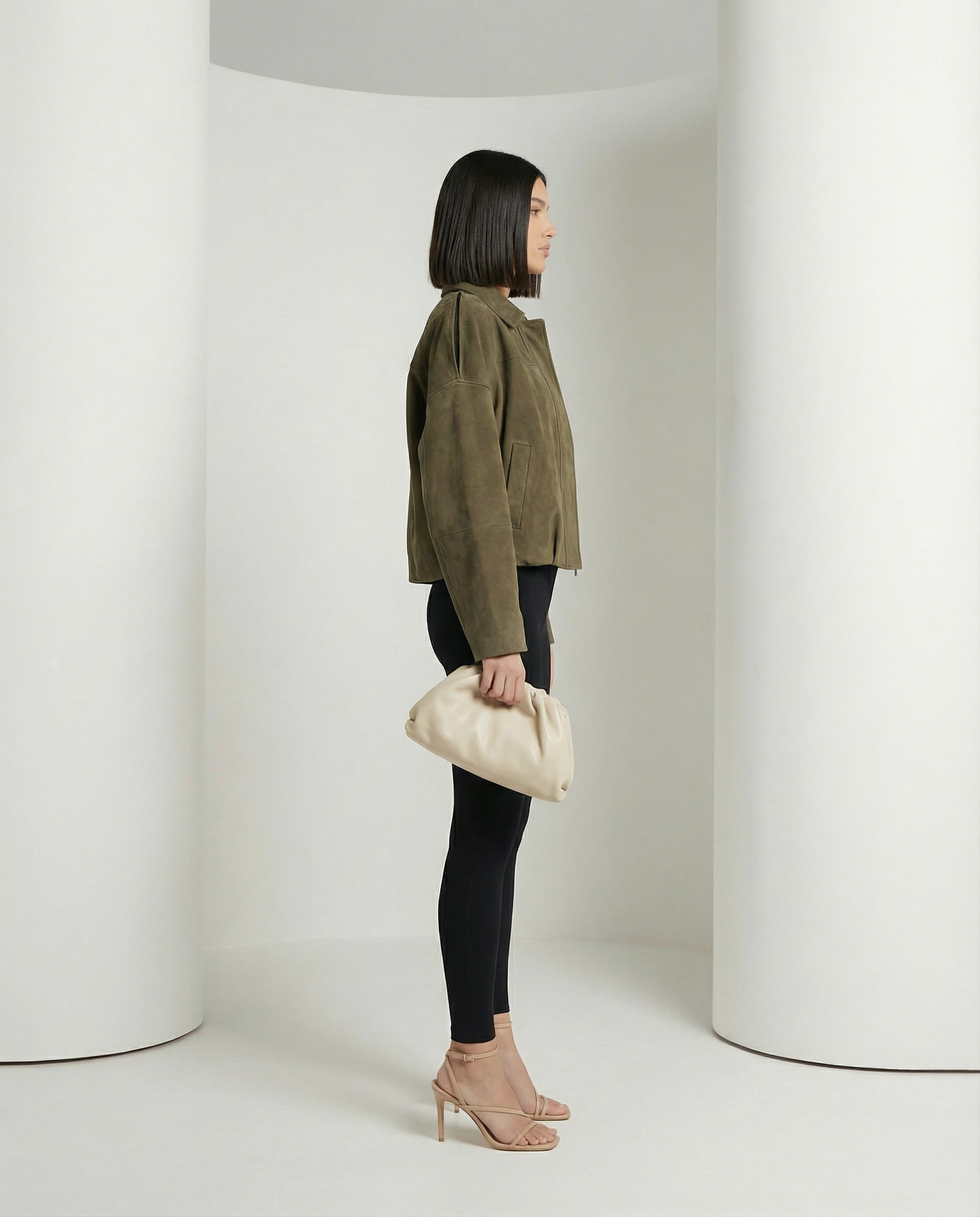 Olive suede Selena Jacket seen from the side, cropped boxy shape with drop shoulders, full length