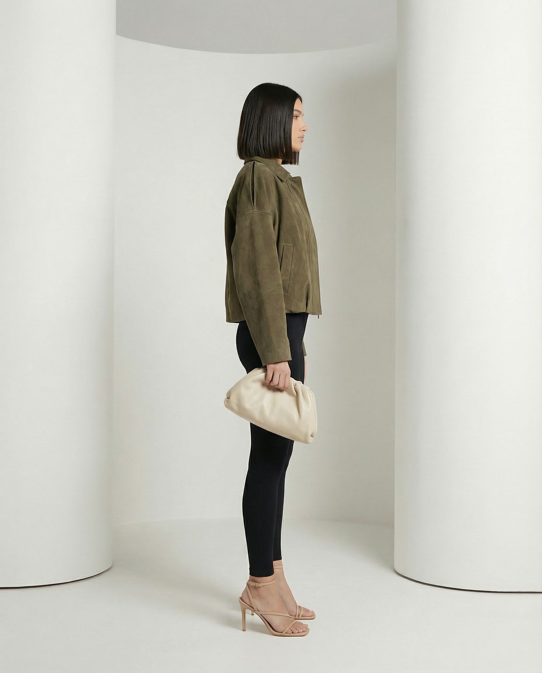Olive suede Selena Jacket seen from the side, cropped boxy shape with drop shoulders, full length