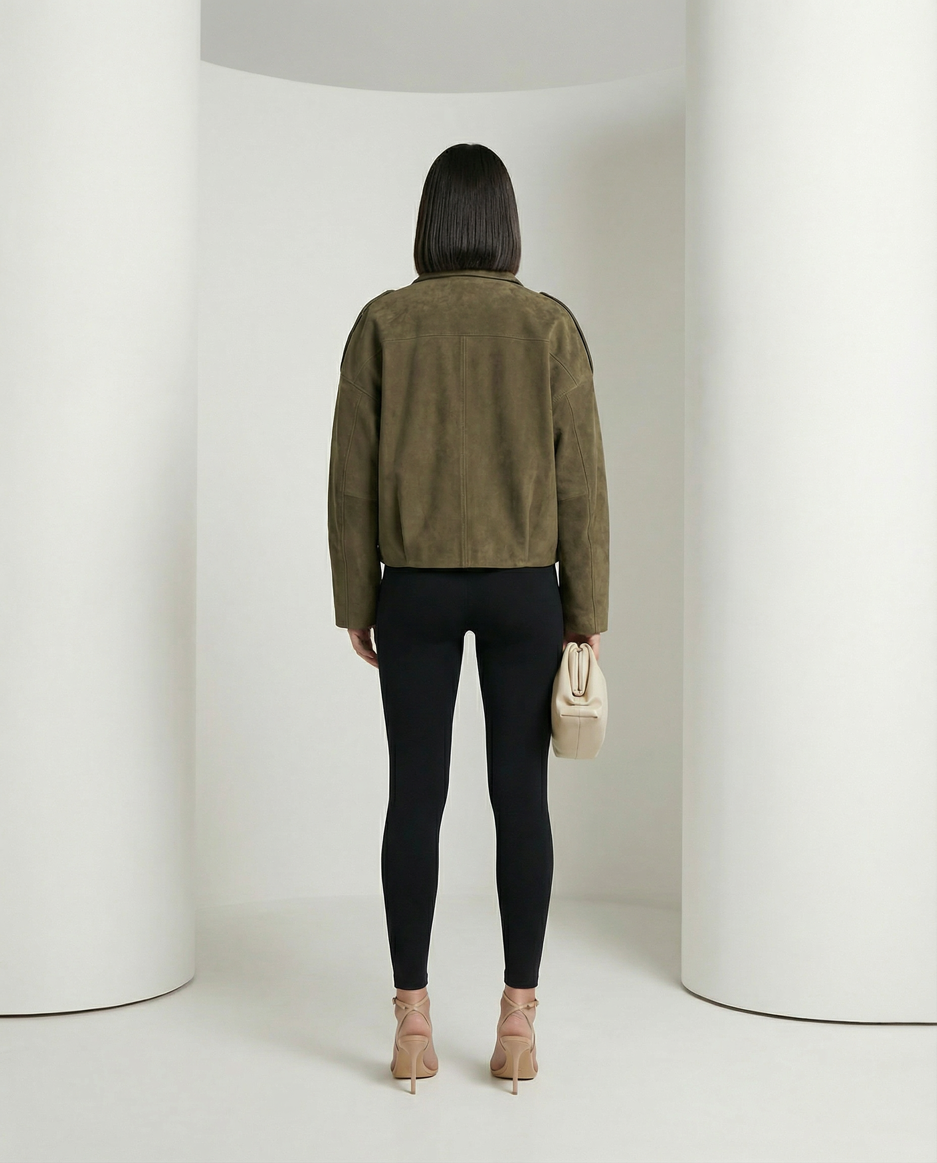 Olive suede bomber from behind, shoulder yoke and boxy cropped back on show, full length back view
