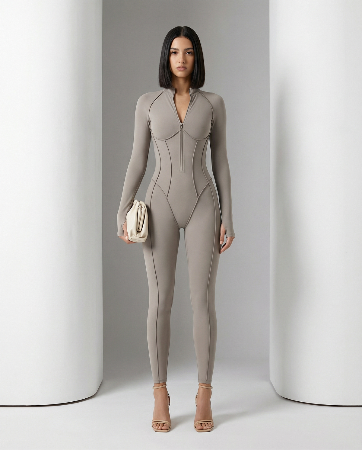 Selene Sculpt Jumpsuit in glacier grey with zip front and corset seaming, front view, full length