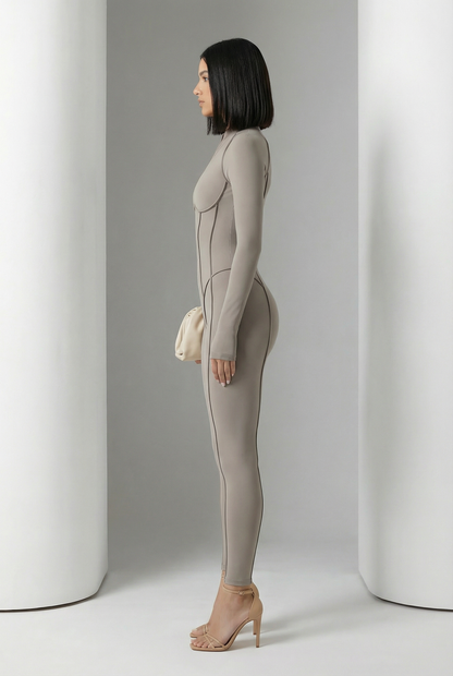Glacier grey Selene Sculpt Jumpsuit in side profile showing curved contour seams to the ankle