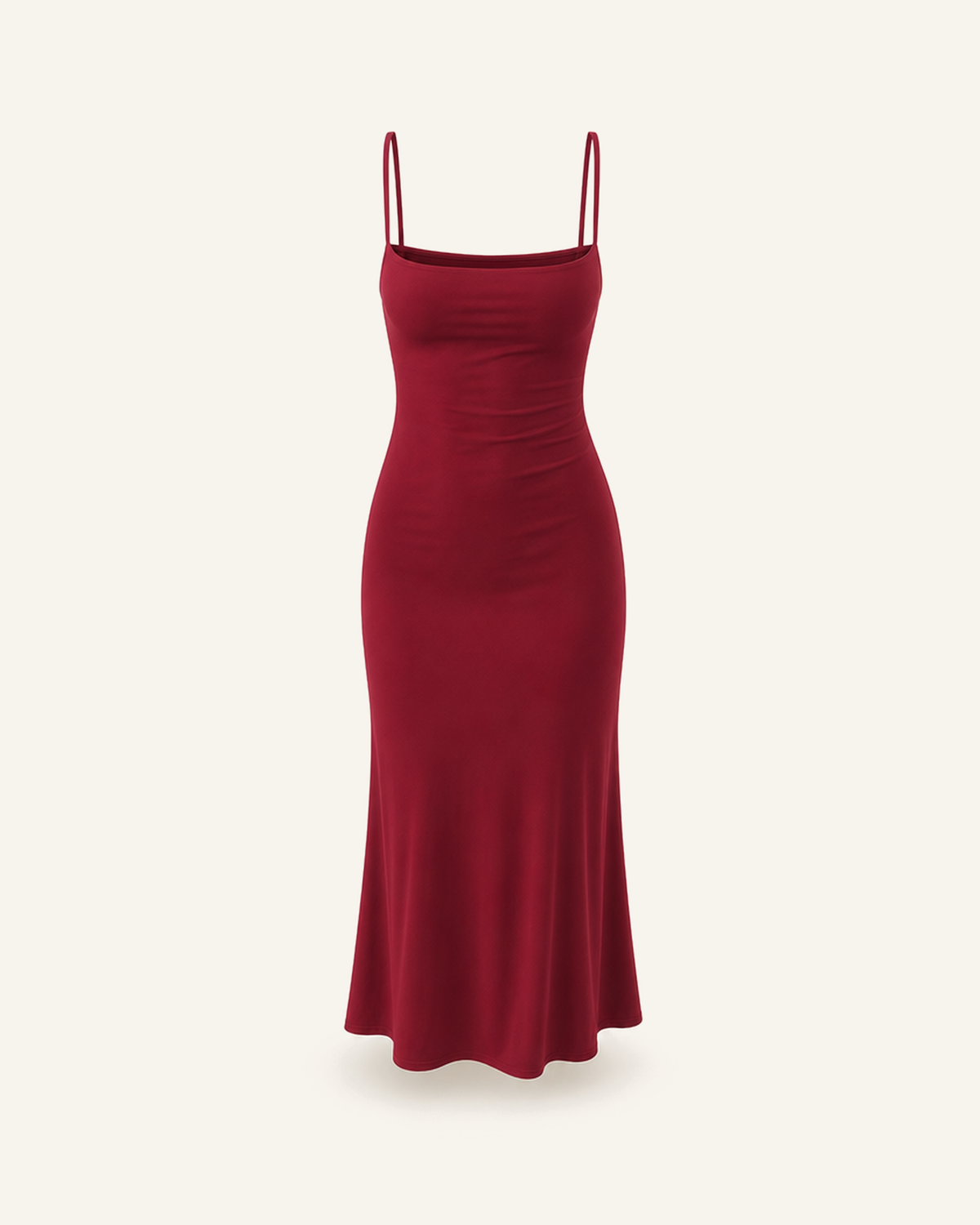The Siv midi slip dress in burgundy, narrow straps, straight neckline and a fluted hem, alone on a bone background