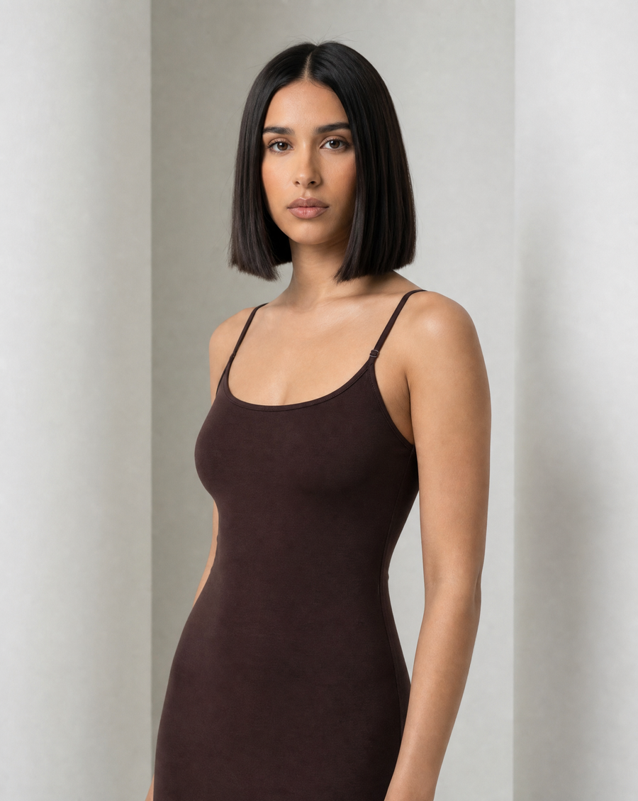 The Siv midi slip dress in espresso, front view, narrow straps and a soft A-line skirt