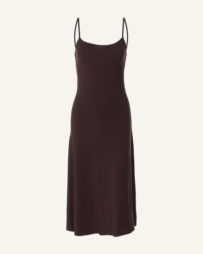 The Siv midi slip dress shown alone in espresso on a bone background, front view