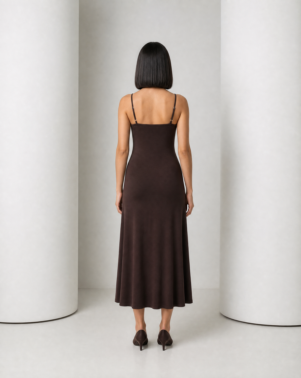 Back of the Siv espresso slip dress, plain back with the strap sliders sitting at the shoulder