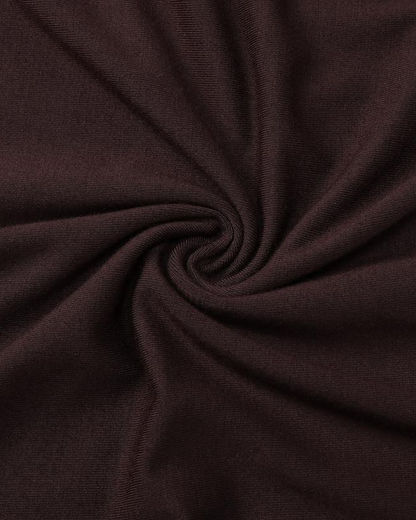 Macro of the Siv espresso jersey, showing the fine knit surface and the way it takes light