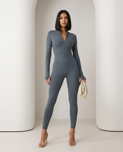 Slate grey long-sleeve jumpsuit front view, seamed bodice and ankle-length fitted legs