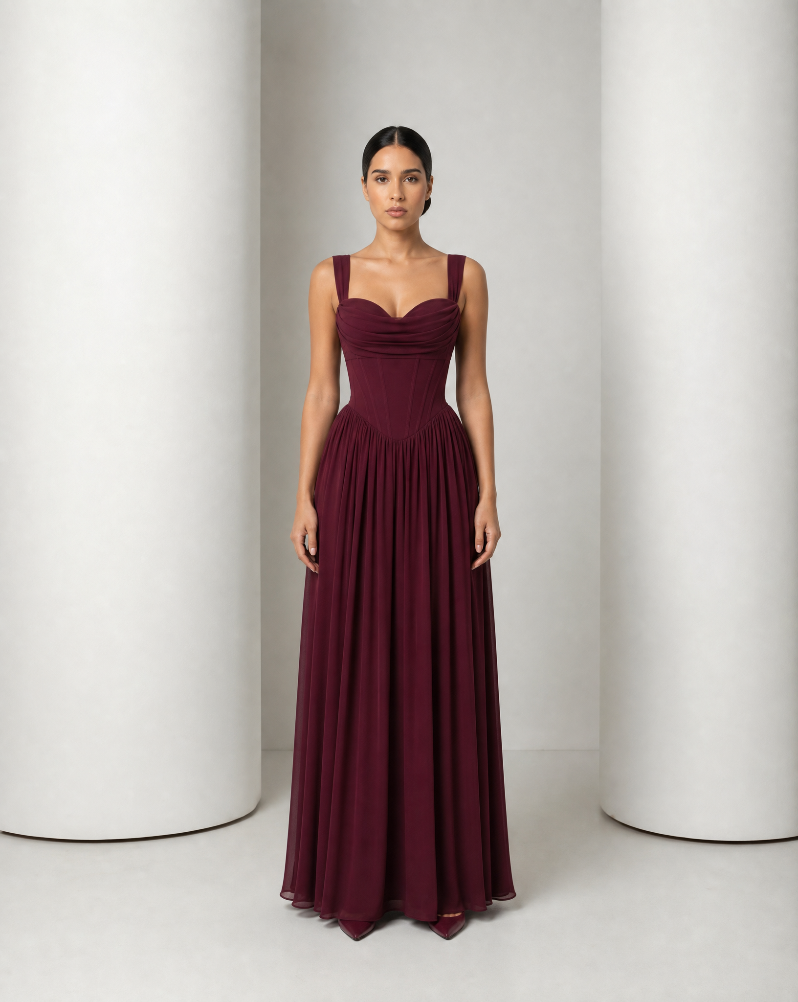 Solveig corset gown in deep burgundy, full-length front view on model