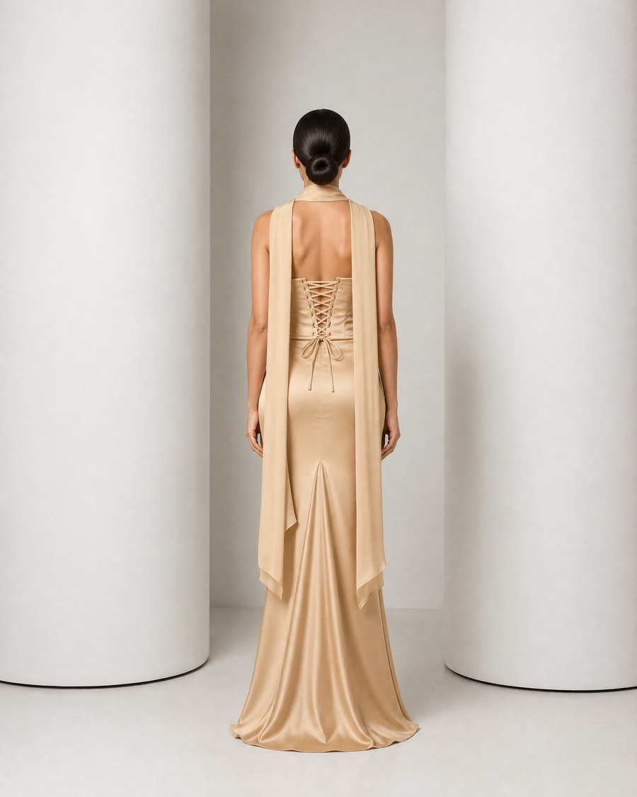 Model in the Sorrel champagne two-piece gown, corset top, mermaid skirt and chiffon scarf
