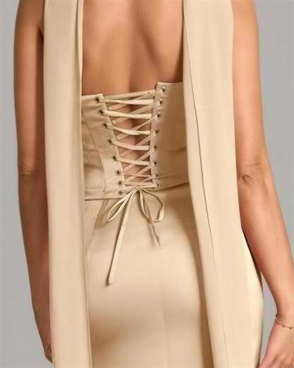 Detail of the Sorrel corset lace-up back, fabric cord crossed through stitched loops