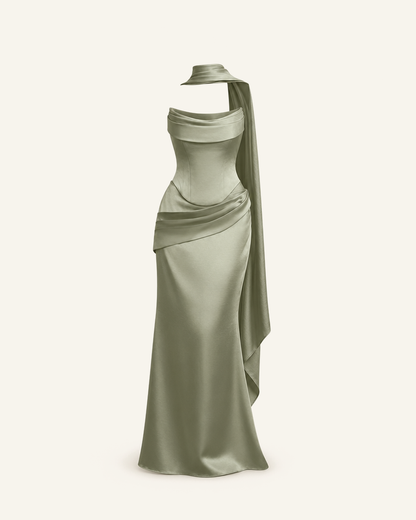 The Sorrel corset two-piece gown in sage green shown alone against a bone background